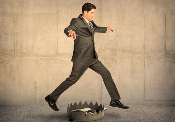 man jumping over a trap